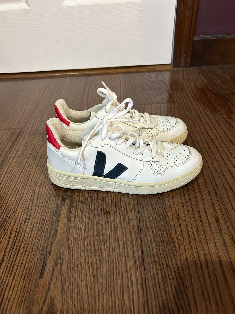 Veja women’s  White Leather Sneakers with Navy V and Red Heel Tab
